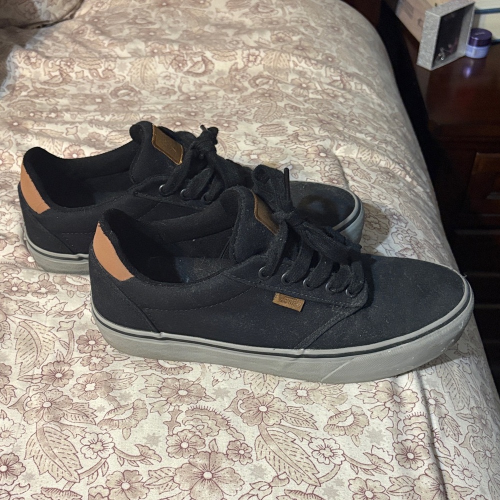 Black and grey men’s Vans Sneakers